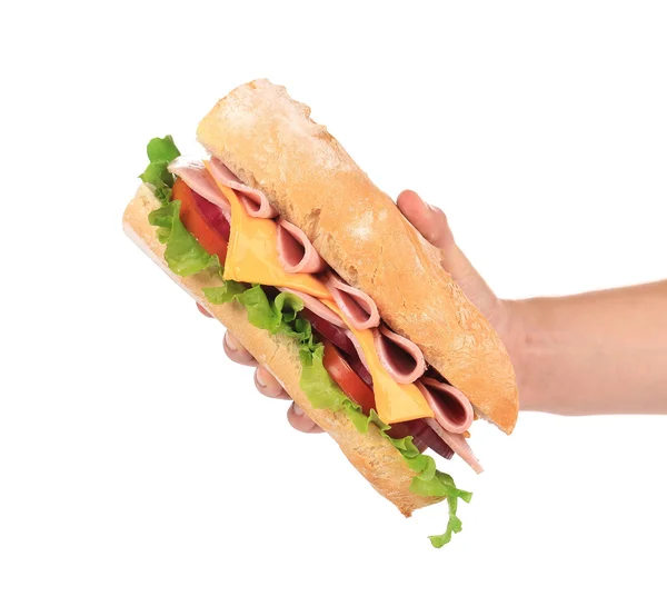 Fransk baguette smörgås i handen. — Stockfoto