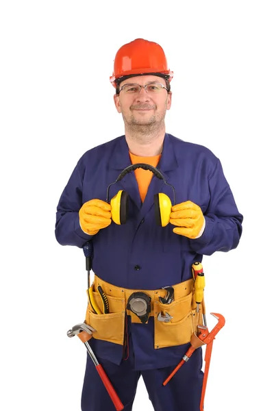 Trabajador de confianza en orejeras y gafas . — Foto de Stock