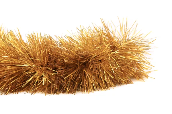 Close up of christmas golden tinsel. — Stock Photo, Image