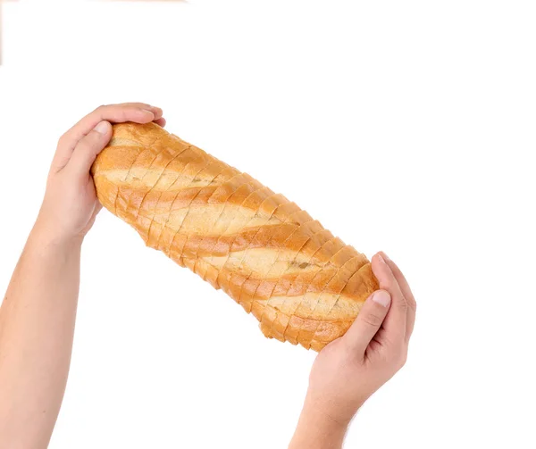 Skivad vitt bröd på en hand. — Stockfoto