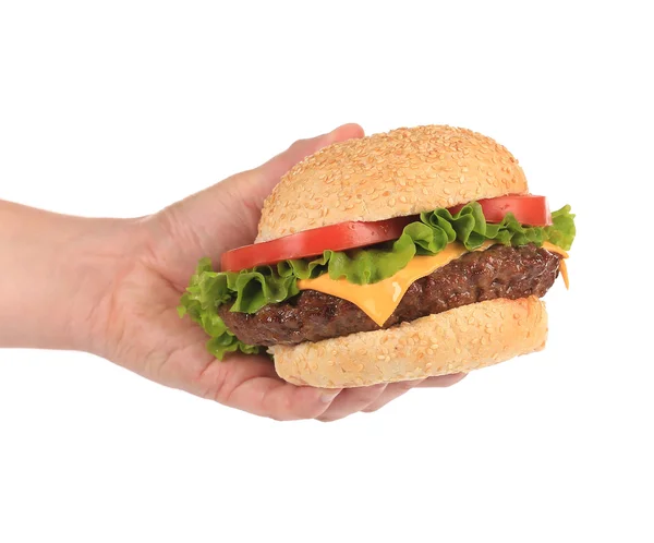 Gran hamburguesa apetitosa en la mano . —  Fotos de Stock