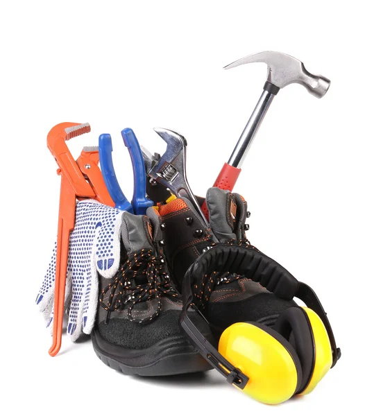 Working tools in boots. — Stock Photo, Image