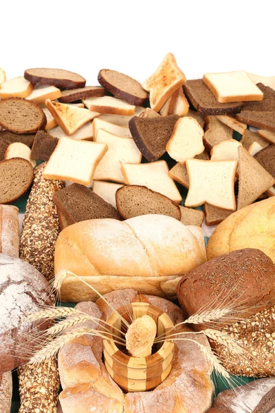 Composition of bread and golden ears. — Stock Photo, Image