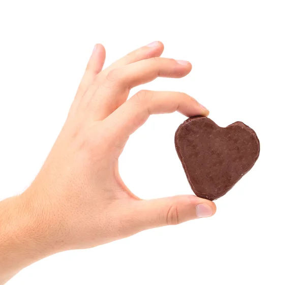 Galletas de beso blanco con chocolate en la mano . — Foto de Stock