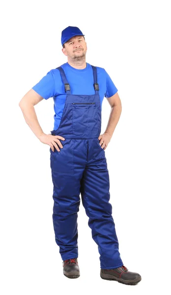 Worker in blue overalls — Stock Photo, Image