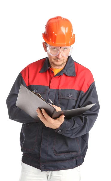 Trabajador escribiendo en carpeta —  Fotos de Stock