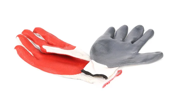 Twee rubber handschoenen rood en grijs. — Stockfoto
