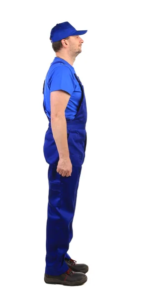 Werknemer in blauwe overalls — Stockfoto