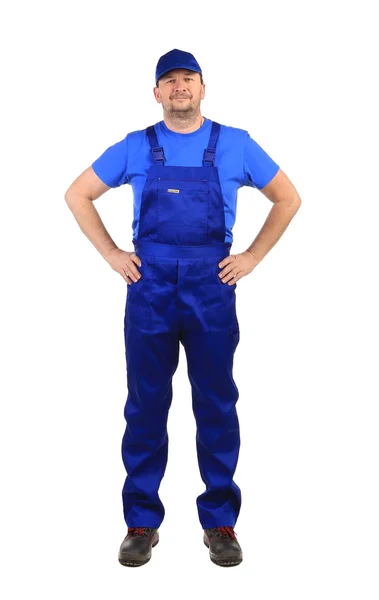 Werknemer in blauwe overalls — Stockfoto