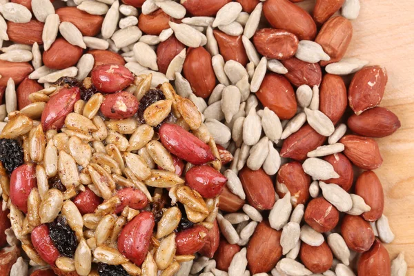 Round candied seeds and nuts with peanuts. — Stock Photo, Image