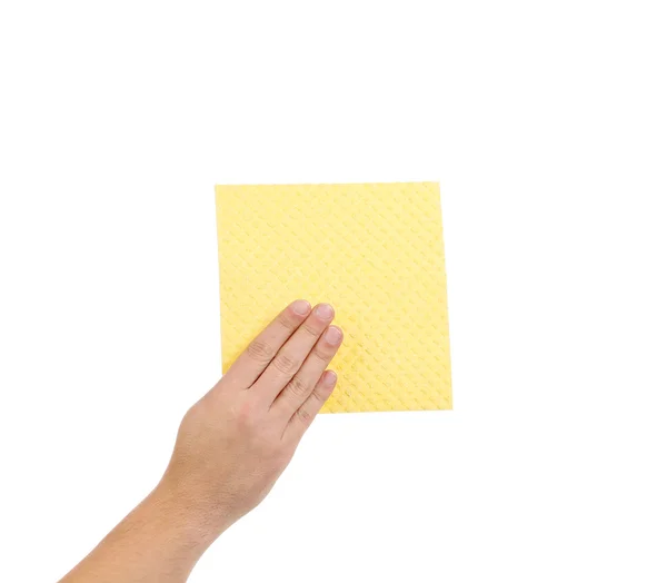 Hand houdt geel schoonmaak spons. — Stockfoto