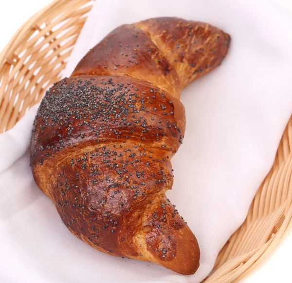 Image of croissant with poppy in a basket. — Stock Photo, Image