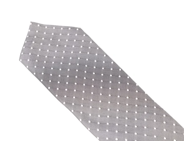 Серый галстук с белым пятном . — стоковое фото