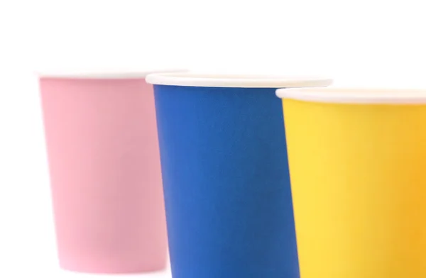 Trois tasses en papier rose bleu et jaune . — Photo