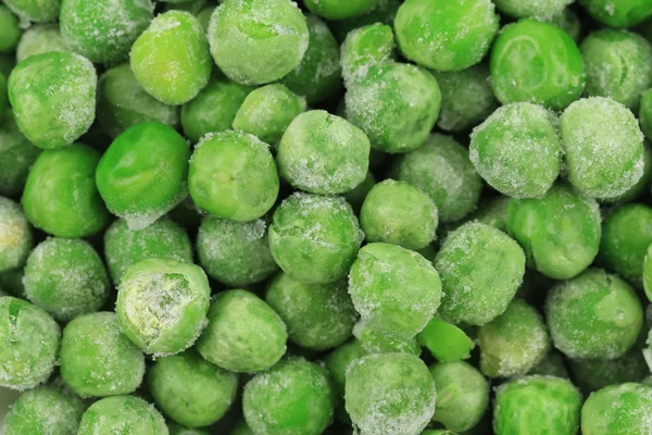 Närbild på frysta gröna ärtor. — Stockfoto