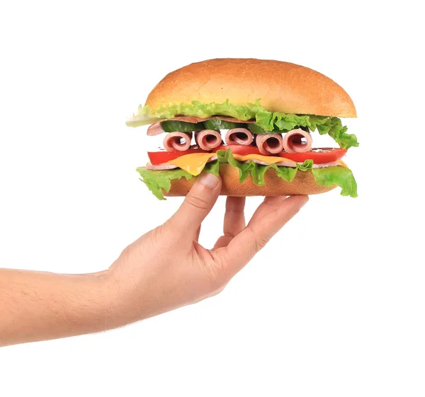 Hand houdt sandwich — Stockfoto