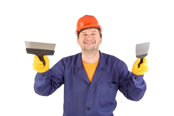 Trabajador en gorro duro sosteniendo espátula . — Foto de Stock