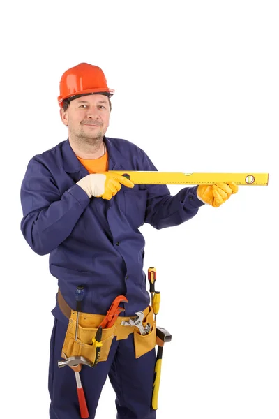 Worker in hardhat holding ruler. — Stock Photo, Image