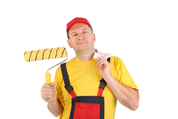 Trabajador con rollo y guante . —  Fotos de Stock