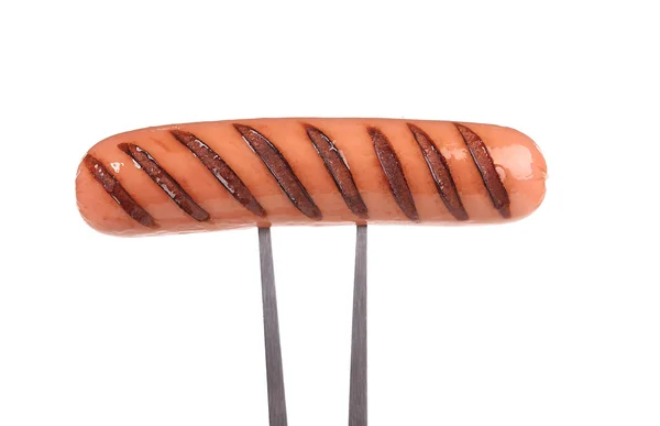 Grilled sausage on a fork — Stock Photo, Image