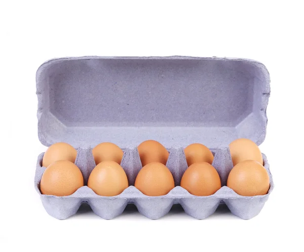 Ten eggs in a blue carton box — Stock Photo, Image