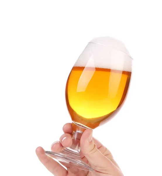 Glass of beer in hand — Stock Photo, Image