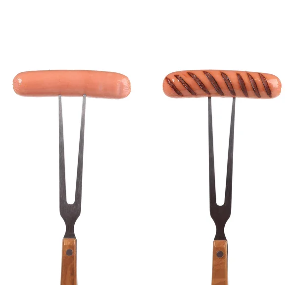 Two grilled sausages on the forks — Stock Photo, Image