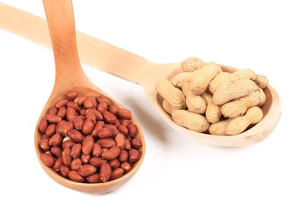 Wooden spoons with peanuts — Stock Photo, Image