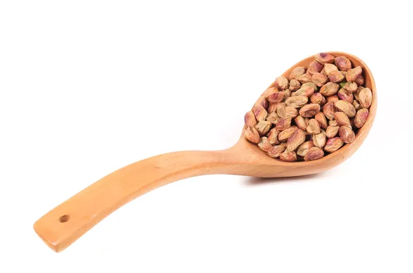 Cucchiaio di legno con pistacchi — Foto Stock
