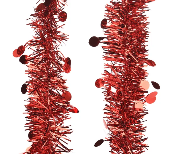 Две параллельные красные мишуры — стоковое фото