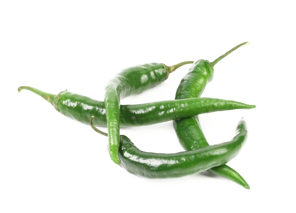 Four green peppers — Stock Photo, Image