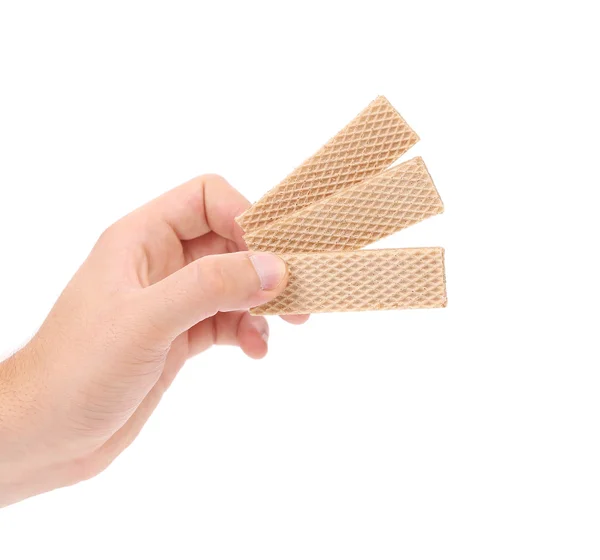 Hand håller wafer av choklad — Stockfoto