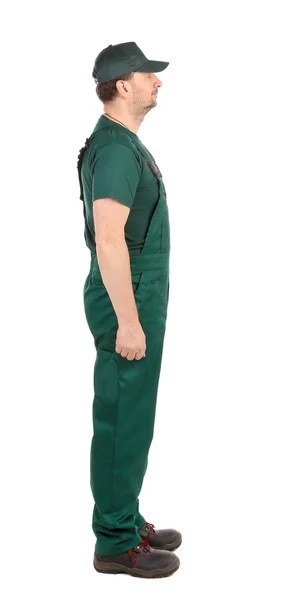 Worker in green overalls — Stock Photo, Image