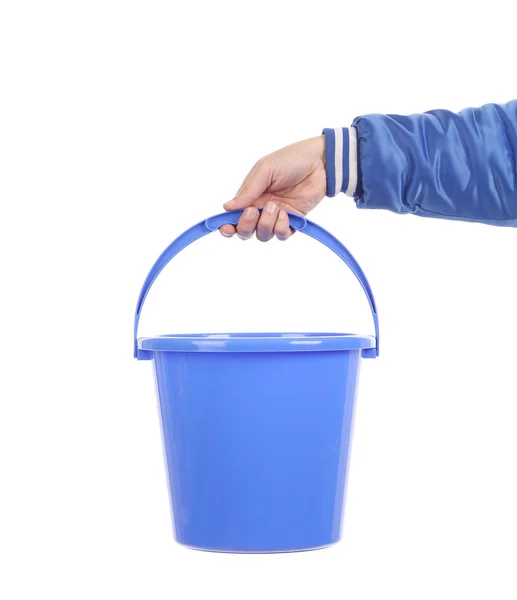 Hand holding blue bucket — Stock Photo, Image