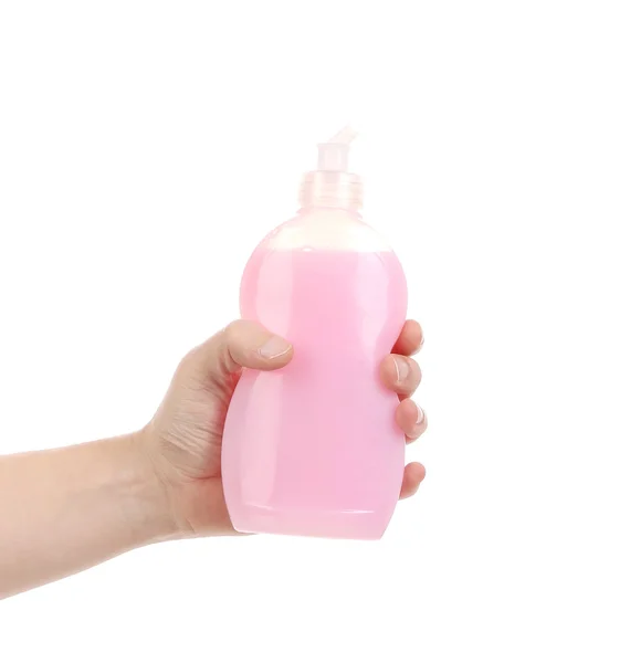 Tenuta in mano bottiglia rosa — Foto Stock