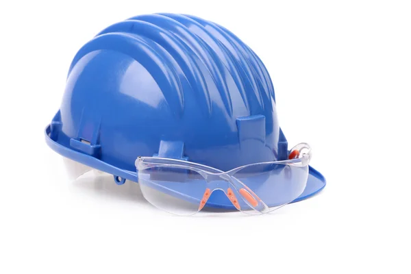 Blue hard hat and glasses — Stock Photo, Image