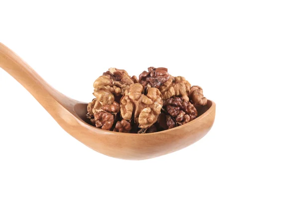 Wooden spoon full with walnuts — Stock Photo, Image