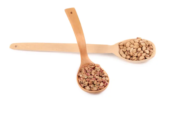 Spoons with pistachios — Stock Photo, Image