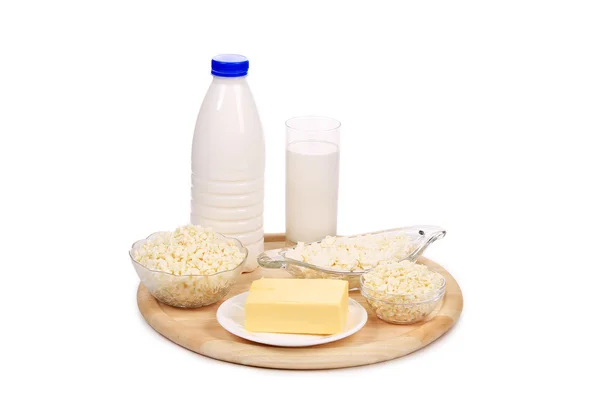 Milk product on wood platter — Stock Photo, Image