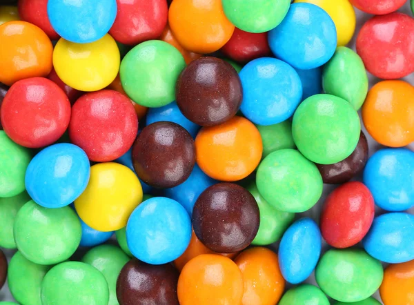 Chocolate balls in colorful glaze — Stock Photo, Image