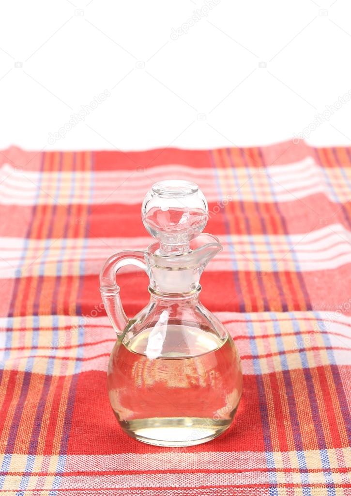 Vinegar in glass carafe on table