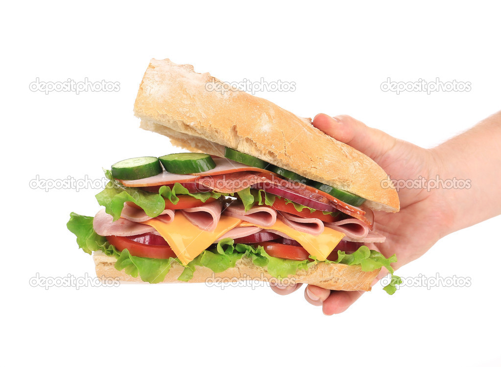 Big fresh sandwich in hands