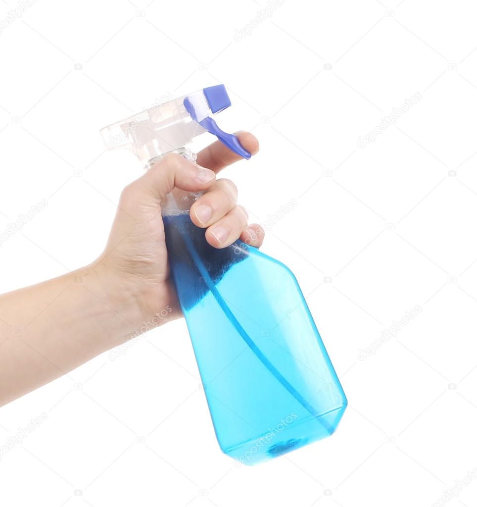 Hand holding spray bottle Stock Photo by ©indigolotos 42592835