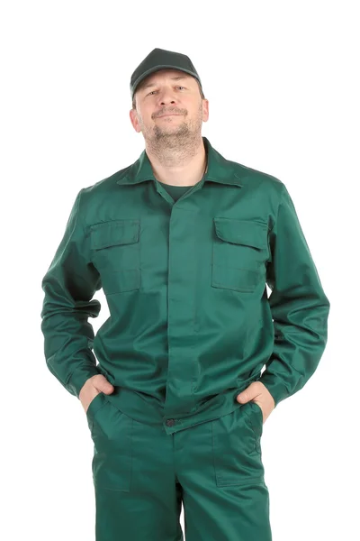 Pracownik w zielony odzież robocza — Zdjęcie stockowe