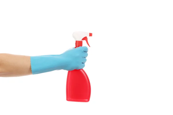 Hand in handschoenen houdt spray fles — Stockfoto