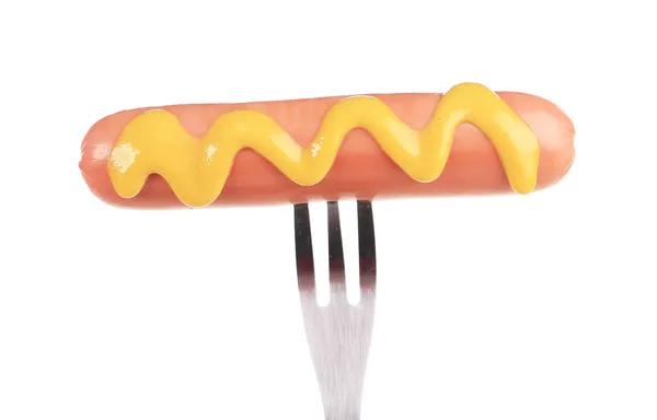 Grilled sausage on a fork — Stock Photo, Image