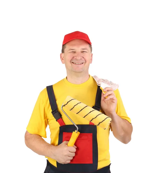 Trabajador en gorra con rollo . — Foto de Stock