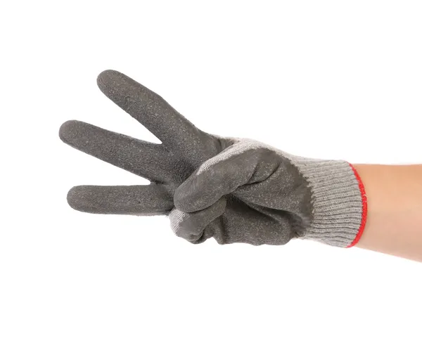 Рука показывает три в резиновых перчатках — стоковое фото