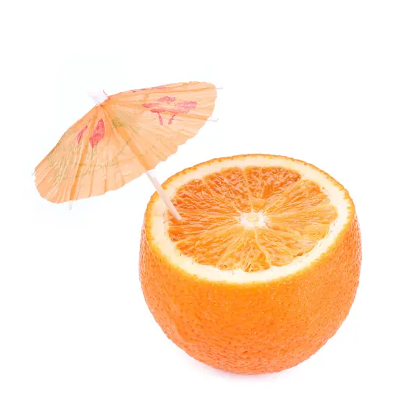 Cut orange with umbrella — Stock Photo, Image