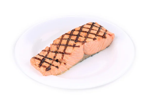 Fried salmon fillet on plate — Stock Photo, Image